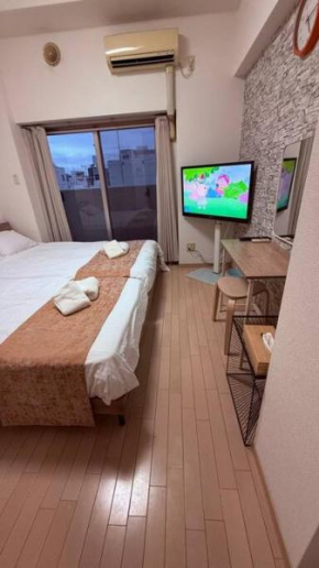 大阪一の繁華街ミナミのど真ん中道頓堀まで歩いて10分以内の好立地静かで清潔感があるお部屋です